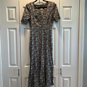 Dress by Sostanza with Floral Derail